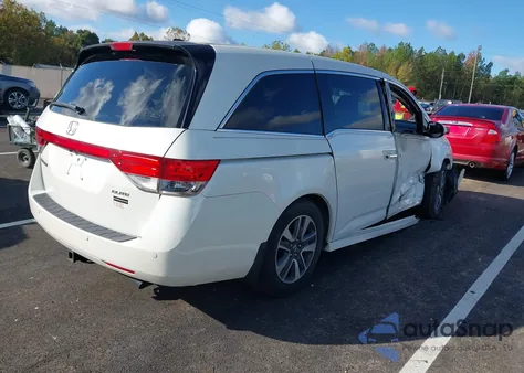 2014 Honda Odyssey Touring/Touring Elite z USA, uszkodzony, nr VIN 5FNRL5H93EB043383